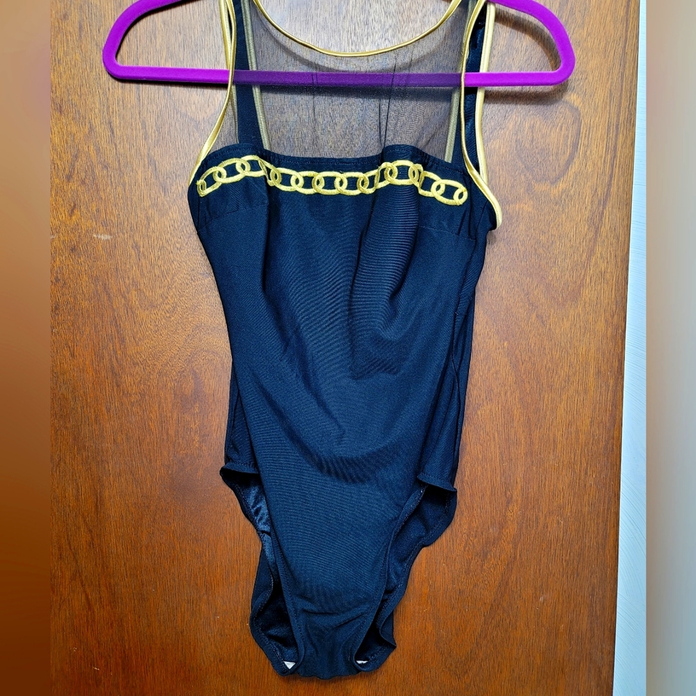 Longitude black and gold one piece bodysuit.   Size 10T.  (545)